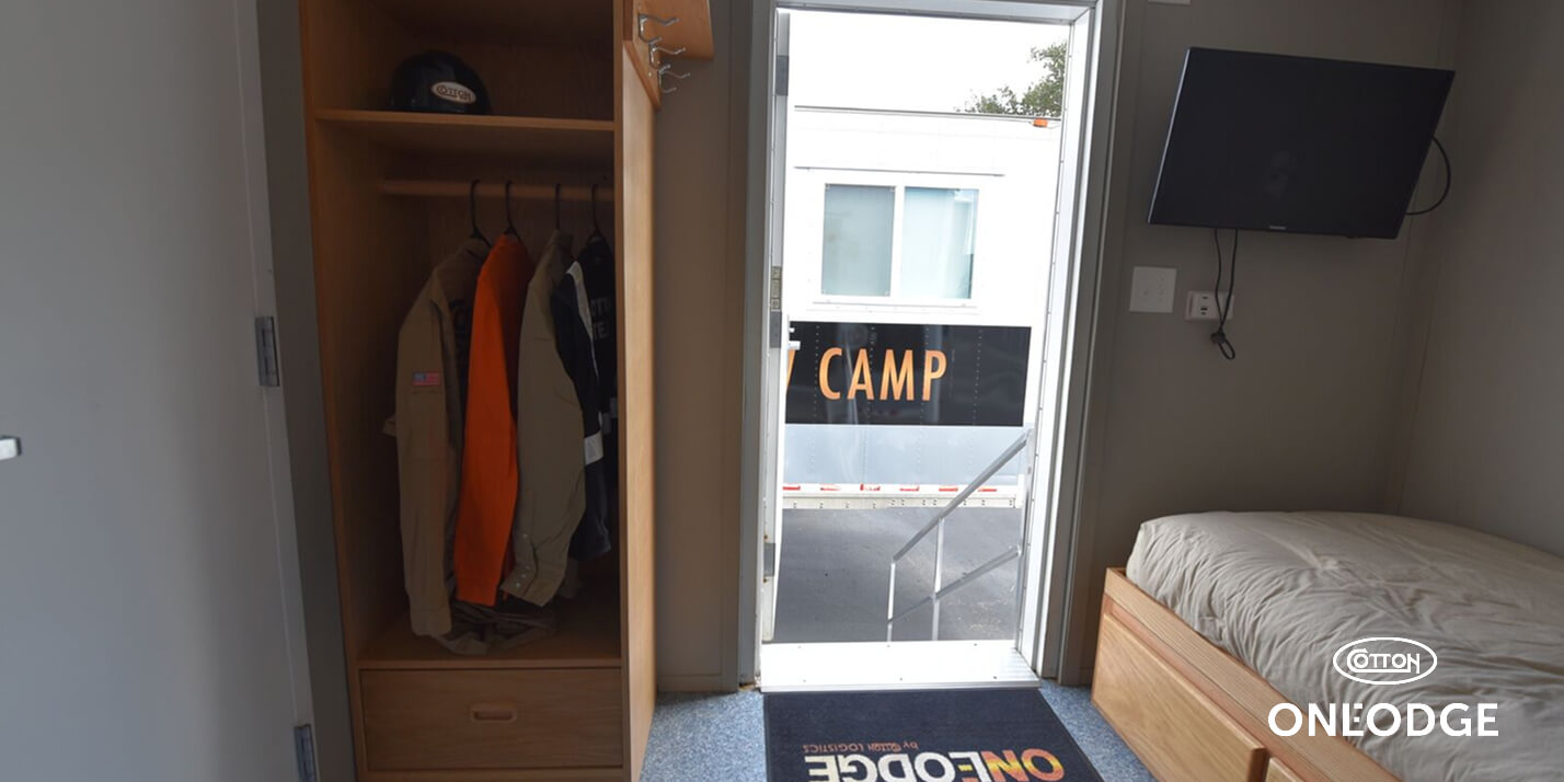 OneLodge private room with a closet, full-size bed and TV